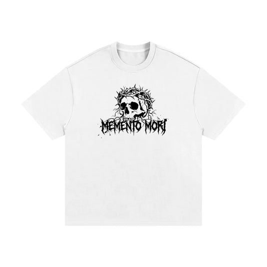 White t-shirt with a black skull design and 'Memento Mori' text on a white background
